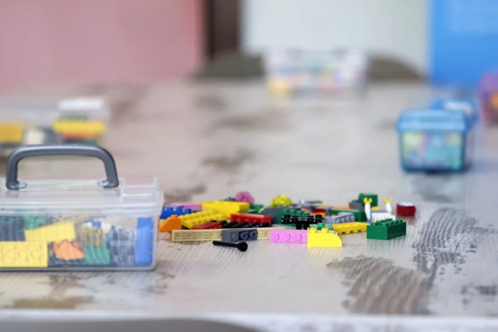 Lego pieces spread over the table.