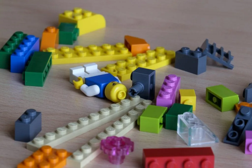 Lego pieces spread over the table.
