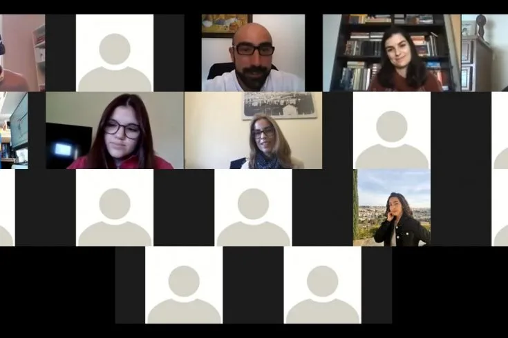 Videoconference still of the collected images of the participants and representatives.