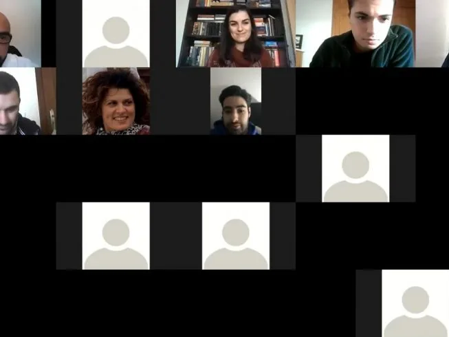 Videoconference still of the collected images of the participants and representatives.