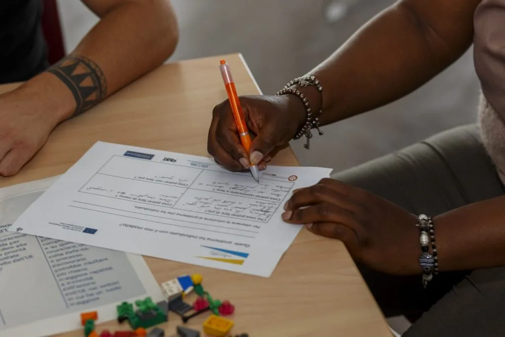 Participant writing their answer to the questionnaire.