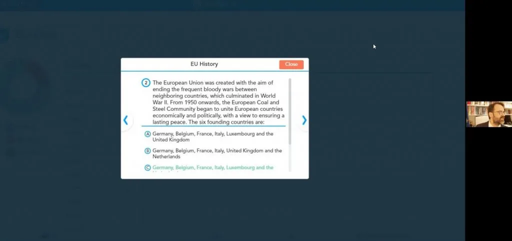 Videoconference still showing a quiz question with answer options.