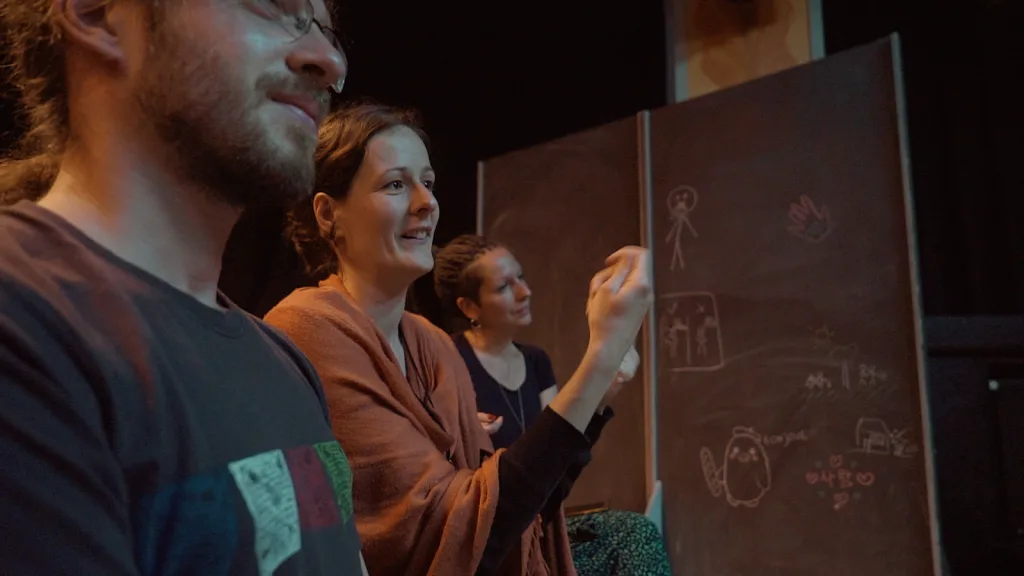 Participants acting.