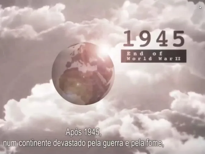 Videoconference still of the videos on EU's political project, showing a planet Earth over the background of a sky and clouds, with "1945" and the words "End of World War II" standing out.